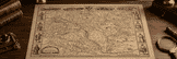 Antique map of Hungary displayed on a wooden desk