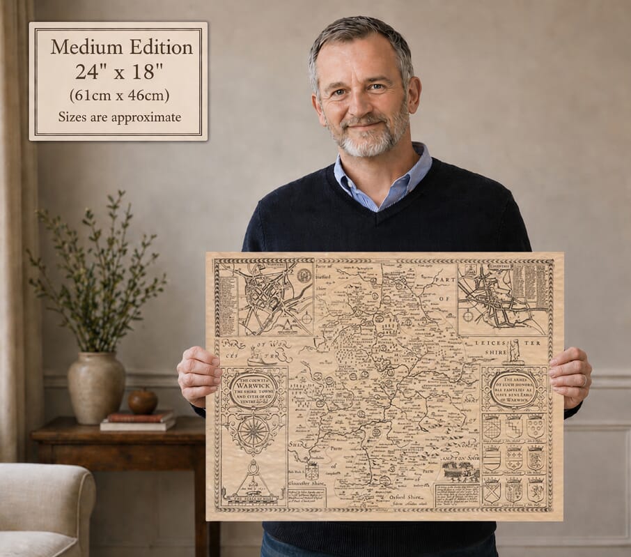 Model holding the medium edition of John Speed’s historic map of Warwickshire for size illustration