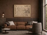 Old map of Essex by John Speed shown framed in an interior