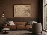 Old map of Essex by John Speed shown framed in an interior
