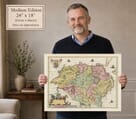 Model holding the medium edition of Blaeu historic map of Ulster for size illustration