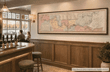 Bowles’s 1793 panoramic map of the River Thames displayed beside the bar in a traditional Thames riverside pub.