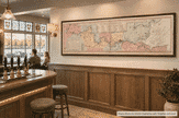 Bowles’s 1793 panoramic map of the River Thames displayed beside the bar in a traditional Thames riverside pub.