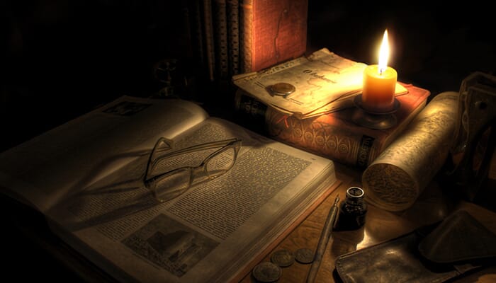 Old Map Company Footer a cndle lit old desk