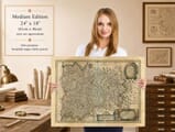 Woman holding the medium 24 × 18 inch old map of the French Alps