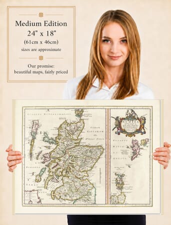 Lady holding the Medium Edition of Joan Blaeu's old map of Ancient Scotland