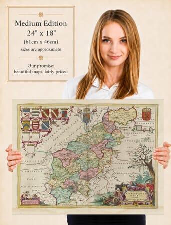 Lady holding the Medium Edition of Joan Blaeu's old map of Northamptonshire