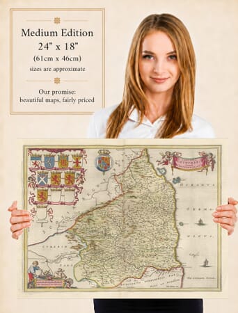 Lady holding the Medium Edition of Joan Blaeu's old map of Northumberland