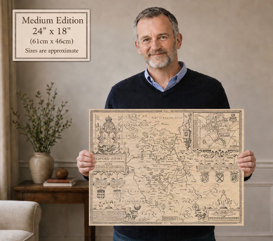 Model holding the Medium Edition old map of Bedfordshire