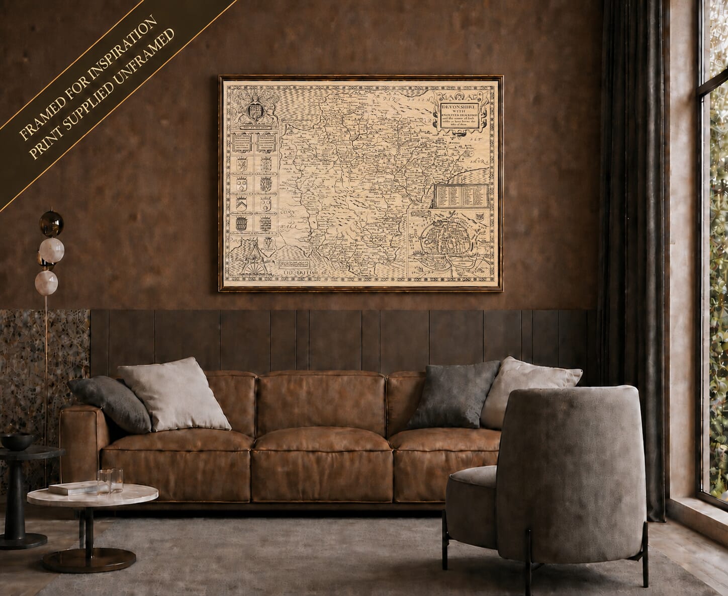 Old map of Devon shown framed on a living-room wall