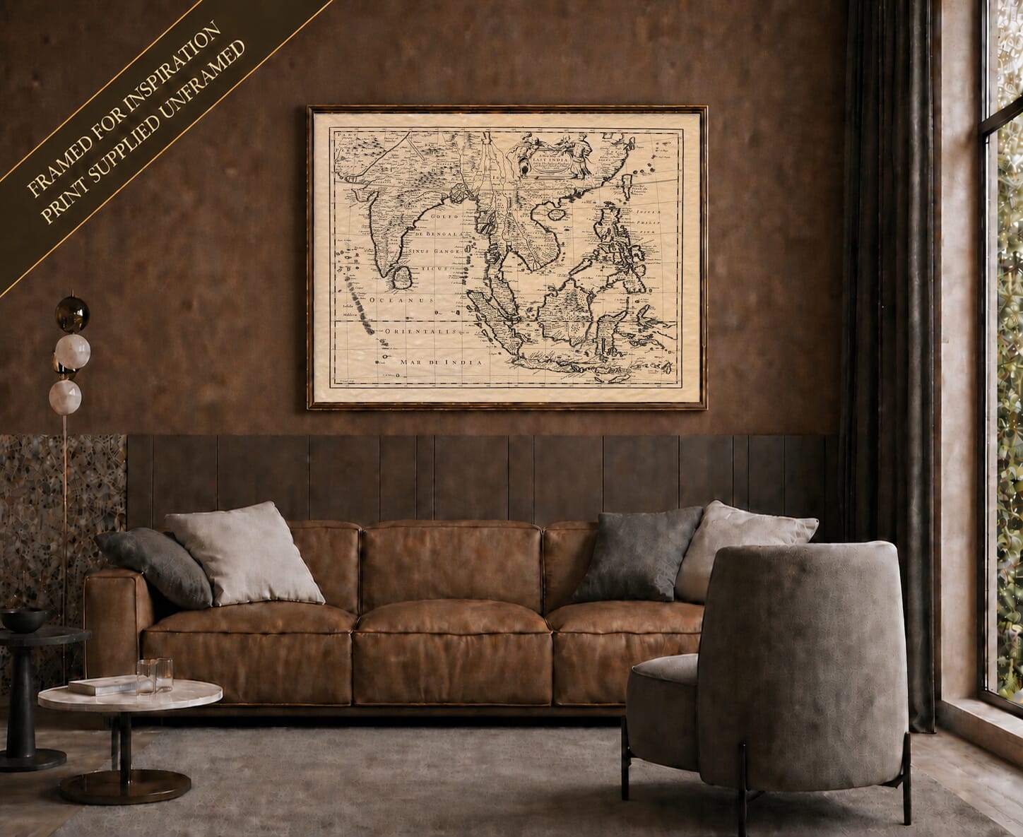 Old map of East India shown framed on a living-room wall