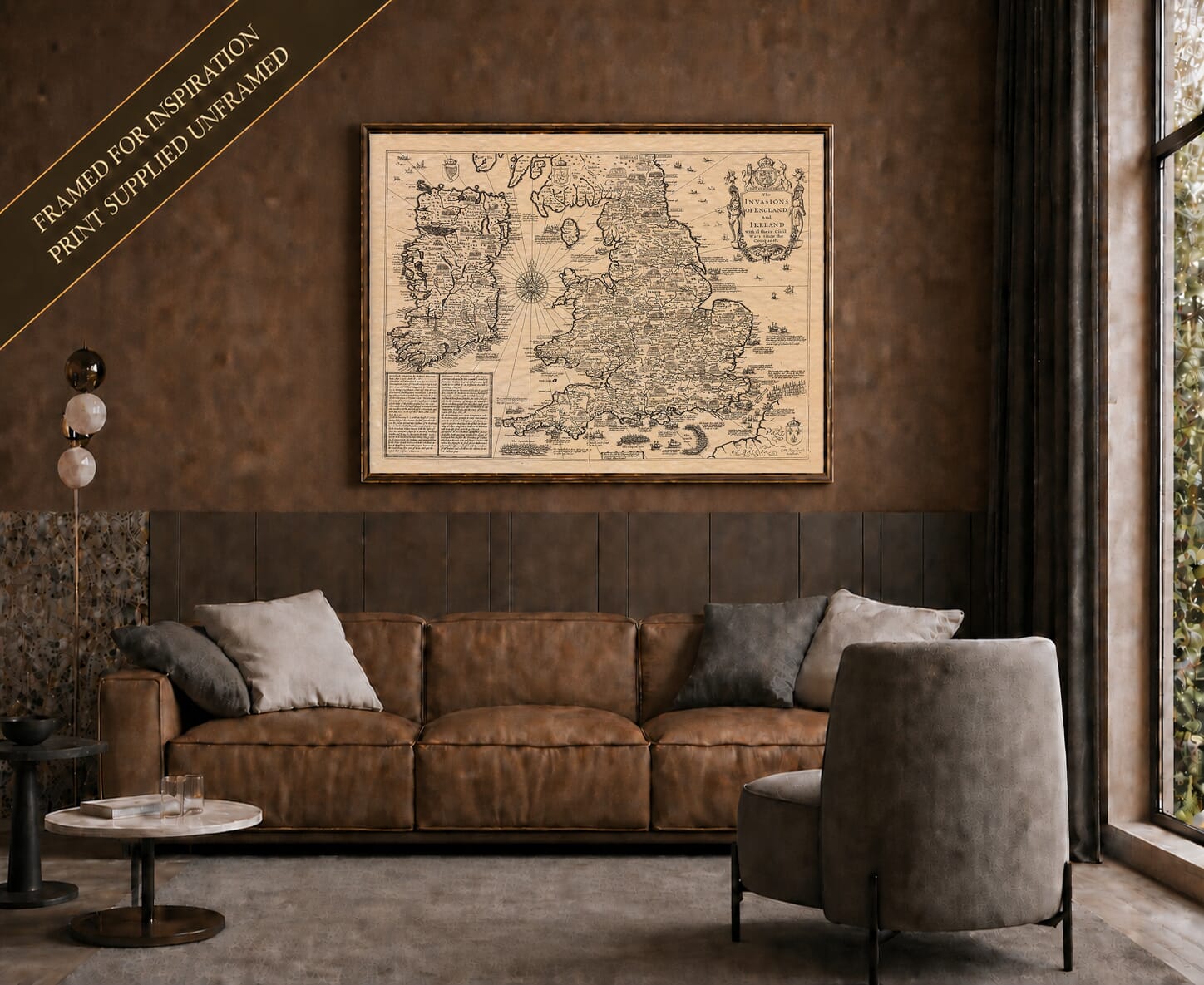Old map of England and Ireland showing invasions and civil wars shown framed on a living-room wall