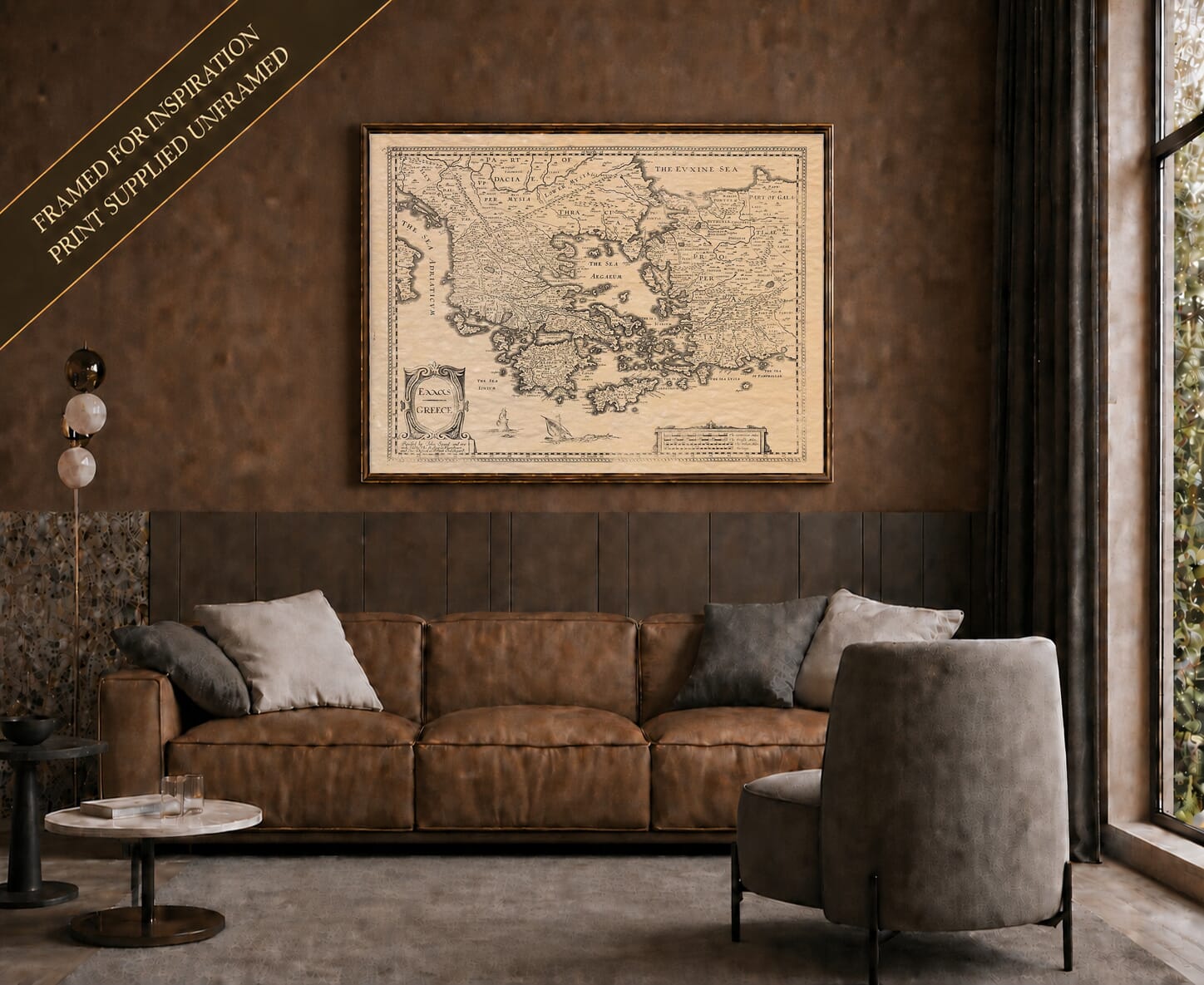 Old map of Greece shown framed on a living-room wall