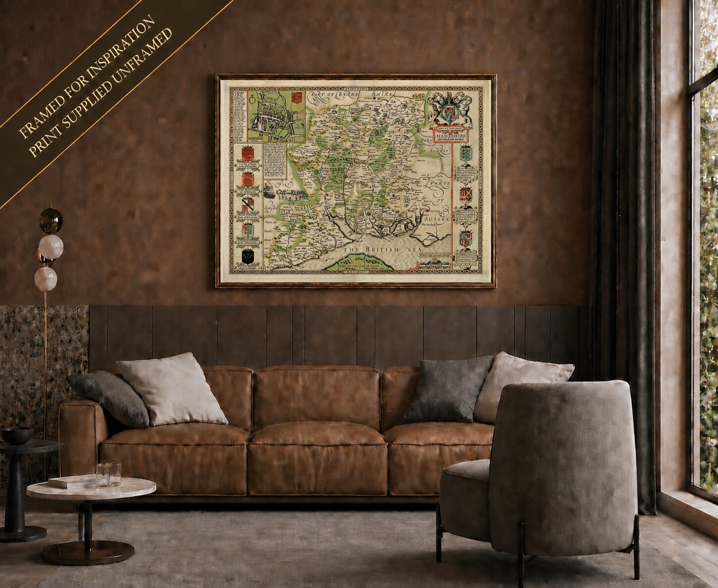Old map of Hampshire (coloured edition) shown framed on a living-room wall