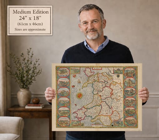 Model holding the Medium Edition old map of Wales (coloured edition)